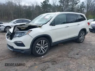 2017 Honda Pilot Elite with VIN 5FNYF6H04HB042192, listed as a IAAI auction lot 41780875 with 158,491 mi miles and . Bid and sale history available at DreamBid. Image 17.