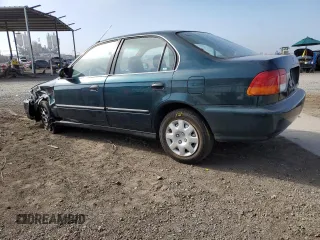 1998 Honda Civic LX with VIN JHMEJ6673WS016828, listed as a Copart auction lot 73740904 with 80,801 mi miles and Salvage Title. Bid and sale history available at carsss.com. Image 2.