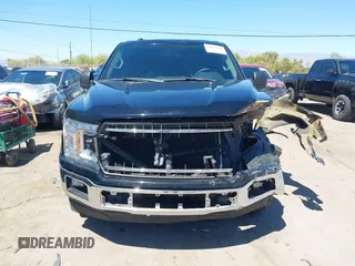 2018 Ford F-150 XL with VIN 1FTEW1C50JKF28600, listed as a IAAI auction lot 42081191 with 105,636 mi miles and . Bid and sale history available at DreamBid. Image 13.