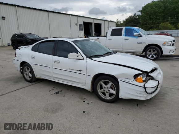 2000 Pontiac Grand Am GT with VIN 1G2NW52E2YM799735, listed as a Copart auction lot 51782455 with 181,850 mi miles and Salvage title. Bid and sale history available at DreamBid. Image 4.