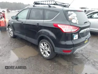 2015 Ford Escape Titanium with VIN 1FMCU0J97FUB45709, listed as a IAAI auction lot 41561636 with 88,296 mi miles. Bid and sale history available at carsss.com. Image 3.