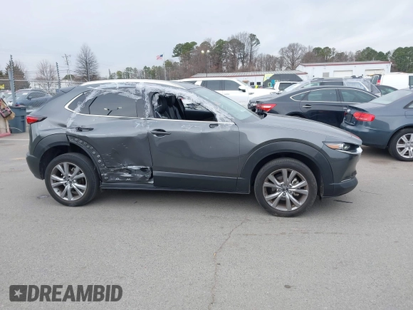 2022 Mazda CX-30 S Premium with VIN 3MVDMBDL9NM434619, listed as a IAAI auction lot 41620655 with 46,557 mi miles and . Bid and sale history available at carsss.com. Image 13.
