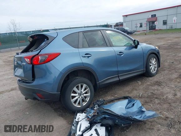 2016 Mazda CX-5 Touring with VIN JM3KE4CY8G0858045, listed as a IAAI auction lot 41941537 with 103,532 mi miles. Bid and sale history available at carsss.com. Image 4.