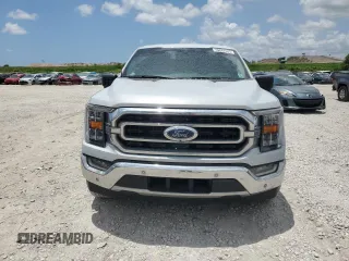 2021 Ford F-150 XL with VIN 1FTEW1CP2MKE62928, listed as a Copart auction lot 59882525 with 32,481 mi miles and Salvage title. Bid and sale history available at DreamBid. Image 5.