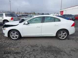 2015 Volvo S60 T5 Drive-E Premier with VIN YV126MFK4F2349564, listed as a IAAI auction lot 41711836 with 59,897 mi miles. Bid and sale history available at carsss.com. Image 14.