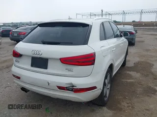 2015 Audi Q3 Premium Plus with VIN WA1EFCFS2FR008193, listed as a IAAI auction lot 42301074 with 102,878 mi miles and . Bid and sale history available at DreamBid. Image 4.