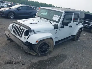 2017 Jeep Wrangler Unlimited Sahara with VIN 1C4HJWEG3HL505307, listed as a IAAI auction lot 42497015 with 92,790 mi miles and . Bid and sale history available at DreamBid. Image 2.