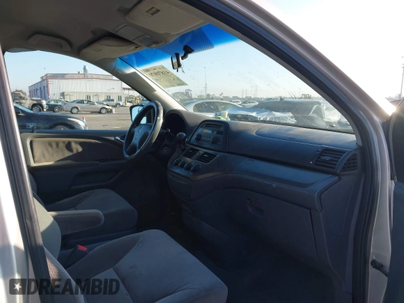 2006 Honda Odyssey LX with VIN 5FNRL382X6B070122, listed as a IAAI auction lot 41870970 with 243,026 mi miles. Bid and sale history available at carsss.com. Image 5.