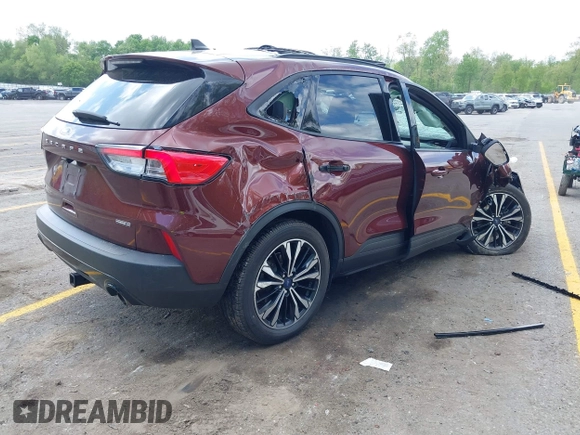 2021 Ford Escape SE Hybrid with VIN 1FMCU9BZ9MUA15592, listed as a IAAI auction lot 42261312 with 56,525 mi miles and . Bid and sale history available at DreamBid. Image 4.