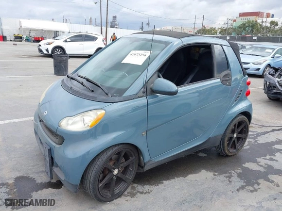 2008 Smart fortwo Passion with VIN WMEEK31X28K158970, listed as a IAAI auction lot 42073256 with 66,703 mi miles. Bid and sale history available at carsss.com. Image 2.