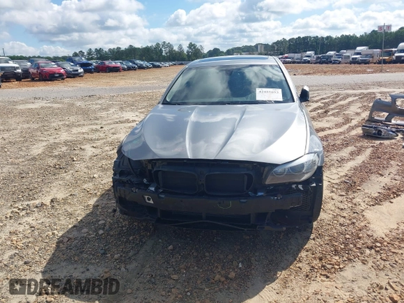 2013 BMW 5 Series 528i with VIN WBAXG5C52DD230133, listed as a IAAI auction lot 42451693 with 131,892 mi miles and . Bid and sale history available at DreamBid. Image 13.