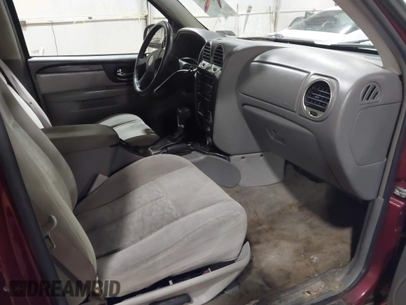 2006 GMC Envoy SLT with VIN 1GKDS13S362135683, listed as a IAAI auction lot 41477501 with 214,760 mi miles. Bid and sale history available at carsss.com. Image 5.