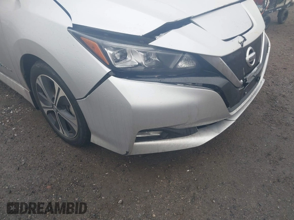 2019 Nissan LEAF SV z VIN 1N4AZ1CP2KC321523, wystawiony jako IAAI lot #41457178 z przebiegiem 28 146 mil mil oraz . Historia ofert i sprzedaży dostępna na DreamBid. Obrazek 6.