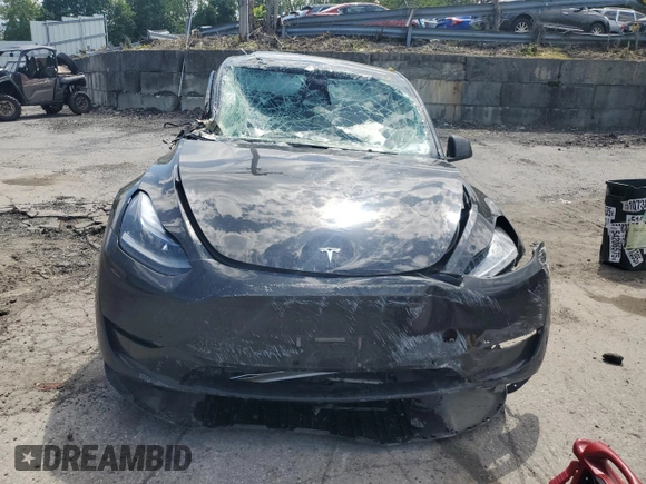 2024 Tesla Model Y Long Range with VIN 7SAYGDEE7RA327259, listed as a Copart auction lot 57494435 with Not provided miles and Salvage title. Bid and sale history available at DreamBid. Image 5.