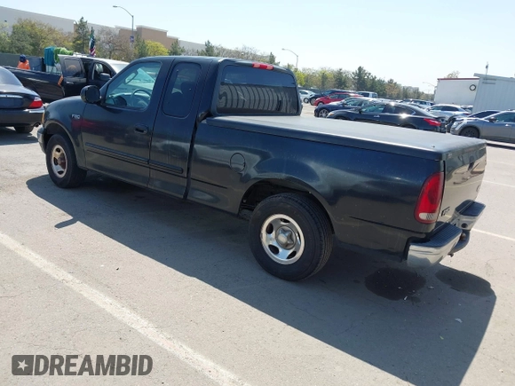 2003 Ford F-150 XL with VIN 1FTRX17213NB70553, listed as a IAAI auction lot 41946968 with 186,683 mi miles. Bid and sale history available at carsss.com. Image 3.