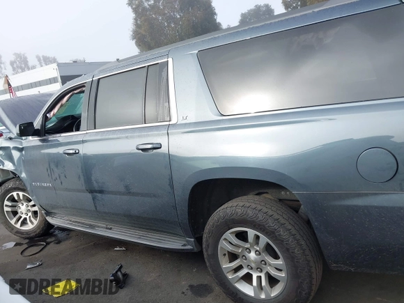 2020 Chevrolet Suburban LT z VIN 1GNSCHKC8LR151570, wystawiony jako IAAI lot #41677348 z przebiegiem Nie podano mil oraz . Historia ofert i sprzedaży dostępna na DreamBid. Obrazek 14.
