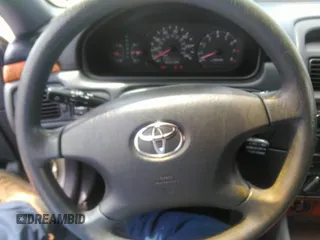 2003 Toyota Solara SE z VIN 2T1CE22P13C021986, wystawiony jako IAAI lot #42514400 z przebiegiem 236 380 mil mil oraz . Historia ofert i sprzedaży dostępna na DreamBid. Obrazek 6.