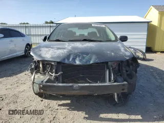 2010 Toyota Corolla with VIN 1NXBU4EEXAZ212290, listed as a Copart auction lot 54184055 with 284,234 mi miles and Salvage Title. Bid and sale history available at DreamBid. Image 5.