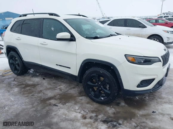 2019 Jeep Cherokee Altitude with VIN 1C4PJMLBXKD320132, listed as a IAAI auction lot 41316702 with 132,056 mi miles. Bid and sale history available at carsss.com. Image 1.