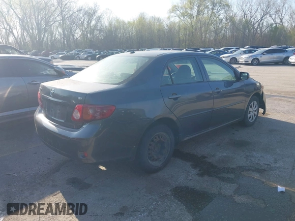 2009 Toyota Corolla with VIN JTDBL40E499083055, listed as a IAAI auction lot 41918173 with 223,308 mi miles. Bid and sale history available at carsss.com. Image 4.