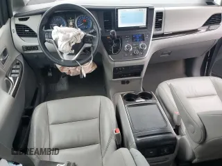 2015 Toyota Sienna XLE с VIN 5TDYK3DC0FS630013, выставлен на аукционе Copart как лот 60044955 с пробегом 124 063 миль миль и Списание • Salvage title. История ставок и продаж доступна на DreamBid. Изображение 8.