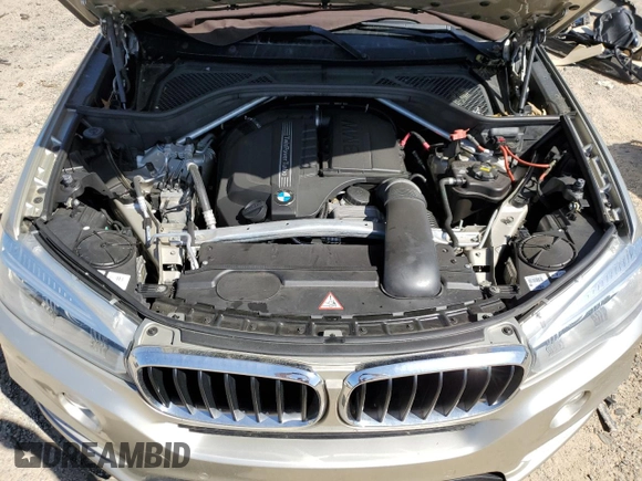 2014 BMW X5 xDrive35i with VIN 5UXKR0C55E0H23681, listed as a Copart auction lot 52183885 with 142,290 mi miles and Salvage Title. Bid and sale history available at carsss.com. Image 12.