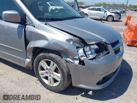 2013 Dodge Grand Caravan Crew with VIN 2C4RDGDG1DR800538, listed as a IAAI auction lot 42211140 with 138,647 mi miles and . Bid and sale history available at DreamBid. Image 6.