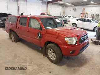 2015 Toyota Tacoma with VIN 3TMLU4EN6FM198294, listed as a IAAI auction lot 42604006 with 130,333 mi miles and . Bid and sale history available at DreamBid. Image 1.