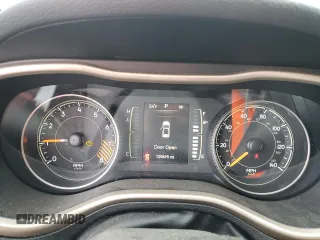 2015 Jeep Cherokee Latitude z VIN 1C4PJMCS7FW515406, wystawiony jako Copart lot #52331155 z przebiegiem 129 815 mil mil oraz Szkoda całkowita • Salvage title. Historia ofert i sprzedaży dostępna na DreamBid. Obrazek 9.