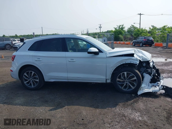 2021 Audi Q5 Premium Plus z VIN WA1BAAFYXM2050028, wystawiony jako IAAI lot #42479898 z przebiegiem 39 015 mil mil oraz . Historia ofert i sprzedaży dostępna na DreamBid. Obrazek 13.