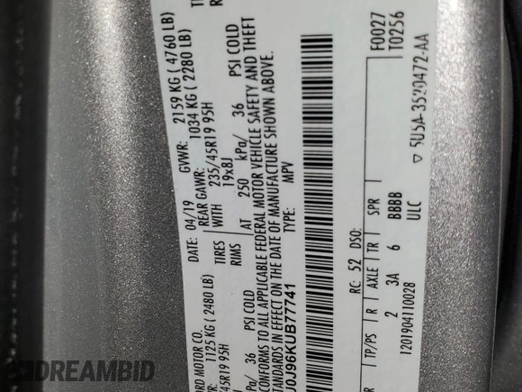 2019 Ford Escape Titanium with VIN 1FMCU0J96KUB77741, listed as a Copart auction lot 57517325 with 90,002 mi miles and Non repairable. Bid and sale history available at DreamBid. Image 13.