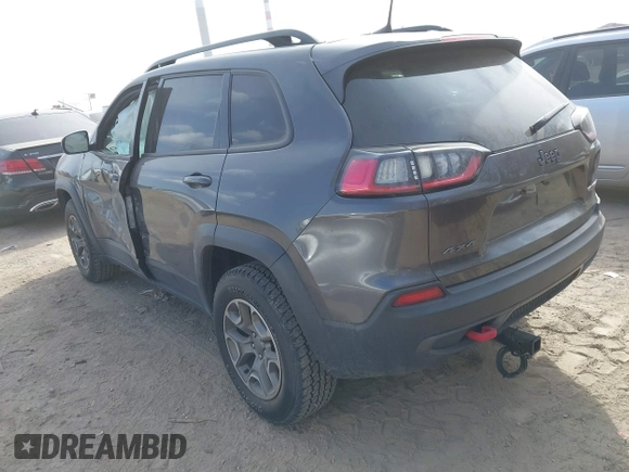 2022 Jeep Cherokee Trailhawk with VIN 1C4PJMBX4ND536592, listed as a IAAI auction lot 41792322 with 43,611 mi miles and . Bid and sale history available at DreamBid. Image 3.