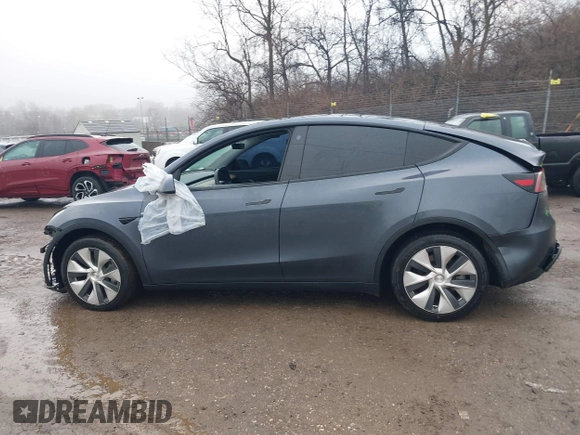 2022 Tesla Model Y Long Range z VIN 7SAYGDEE9NF331410, wystawiony jako IAAI lot #41580172 z przebiegiem 81 794 mil mil oraz . Historia ofert i sprzedaży dostępna na DreamBid. Obrazek 14.