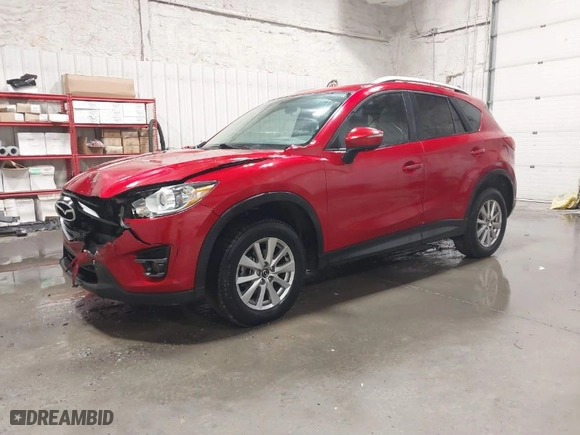 2016 Mazda CX-5 Touring with VIN JM3KE2CY5G0899995, listed as a IAAI auction lot 41743481 with NaN miles. Bid and sale history available at carsss.com. Image 2.
