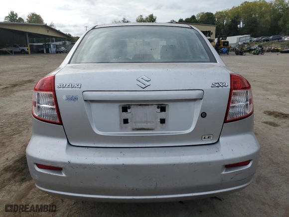 2010 Suzuki SX4 LE with VIN JS2YC5A21A6303767, listed as a Copart auction lot 72063074 with 114,140 mi miles and Clean Title. Bid and sale history available at carsss.com. Image 6.