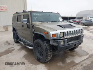 2005 Hummer H2 SUV with VIN 5GRGN23U95H132238, listed as a IAAI auction lot 41809909 with 300,293 mi miles. Bid and sale history available at carsss.com. Image 1.