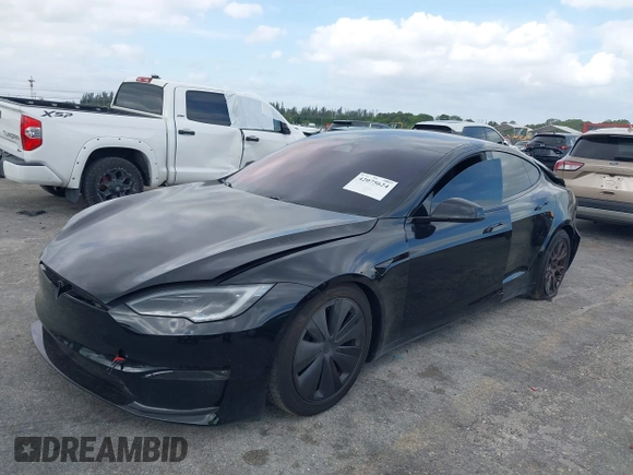 2023 Tesla Model S with VIN 5YJSA1E53PF510757, listed as a IAAI auction lot 42075624 with Not provided miles and . Bid and sale history available at DreamBid. Image 2.