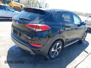 2017 Hyundai Tucson Sport with VIN KM8J3CA29HU400376, listed as a IAAI auction lot 42051949 with 82,717 mi miles and . Bid and sale history available at DreamBid. Image 4.