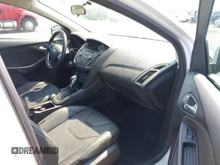 2016 Ford Focus SE with VIN 1FADP3F20GL329898, listed as a IAAI auction lot 42844995 with 20,485 mi miles and . Bid and sale history available at DreamBid. Image 5.