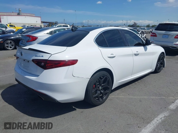 2019 Alfa Romeo Giulia z VIN ZARFAMAN4K7621122, wystawiony jako IAAI lot #41934779 z przebiegiem 57 246 mil mil oraz . Historia ofert i sprzedaży dostępna na DreamBid. Obrazek 4.