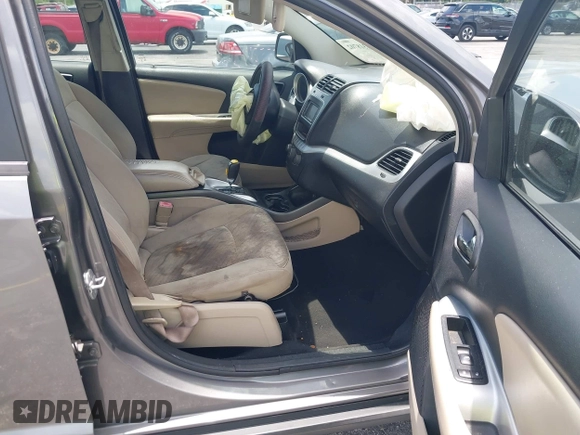 2013 Dodge Journey SE with VIN 3C4PDCAB3DT626929, listed as a IAAI auction lot 42318702 with Not provided miles and . Bid and sale history available at DreamBid. Image 5.