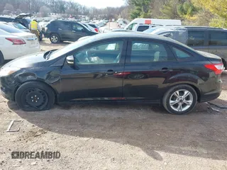 2013 Ford Focus SE z VIN 1FADP3F28DL312357, wystawiony jako IAAI lot #41798311 z przebiegiem 98 280 mil mil oraz . Historia ofert i sprzedaży dostępna na DreamBid. Obrazek 14.