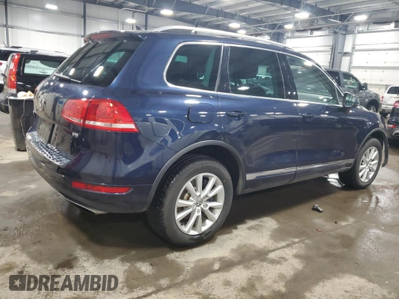 2014 Volkswagen Touareg Lux z VIN WVGEF9BP4ED006236, wystawiony jako Copart lot #47394505 z przebiegiem 85 179 mil mil oraz Szkoda całkowita • Salvage title. Historia ofert i sprzedaży dostępna na DreamBid. Obrazek 3.