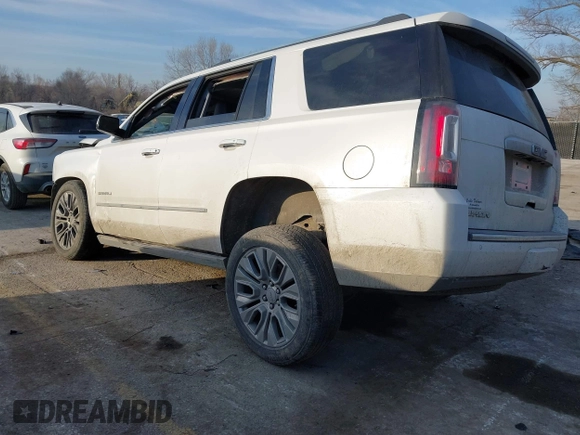 2017 GMC Yukon Denali with VIN 1GKS2CKJ4HR310822, listed as a IAAI auction lot 41666174 with 101,388 mi miles. Bid and sale history available at carsss.com. Image 3.