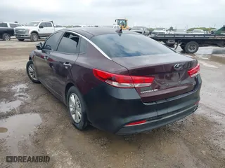 2016 Kia Optima LX with VIN 5XXGT4L3XGG027430, listed as a IAAI auction lot 41940146 with 75,456 mi miles. Bid and sale history available at carsss.com. Image 3.