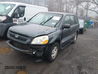 2003 Honda Pilot LX with VIN 2HKYF181X3H610581, listed as a IAAI auction lot 41743077 with 212,207 mi miles and . Bid and sale history available at DreamBid. Image 2.