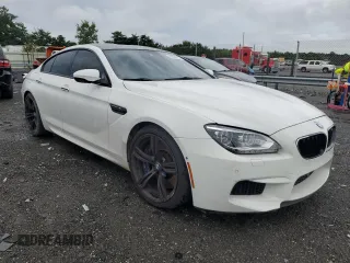 2015 BMW M6 z VIN WBS6C9C56FD467625, wystawiony jako Copart lot #64269363 z przebiegiem 92 698 mil mil oraz Nie do naprawy. Historia ofert i sprzedaży dostępna na DreamBid. Obrazek 4.