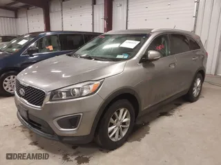 2017 Kia Sorento LX V6 with VIN 5XYPGDA55HG217691, listed as a IAAI auction lot 42083111 with 124,444 mi miles. Bid and sale history available at carsss.com. Image 2.