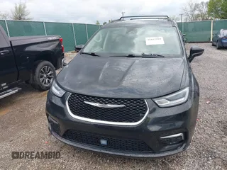 2022 Chrysler Pacifica Touring L with VIN 2C4RC1BG9NR194782, listed as a IAAI auction lot 41842410 with 76,231 mi miles and . Bid and sale history available at DreamBid. Image 12.