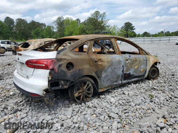 2018 Ford Focus SE z VIN 1FADP3FE4JL265608, wystawiony jako Copart lot #50029575 z przebiegiem Nie podano mil oraz Szkoda całkowita • Salvage title. Historia ofert i sprzedaży dostępna na DreamBid. Obrazek 3.